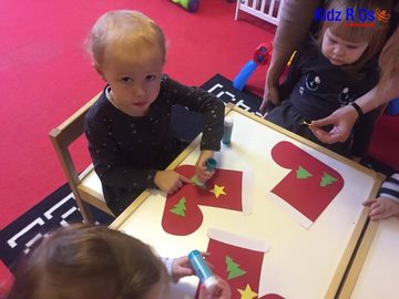 Playing together in the daycare room at Kidz R Os
